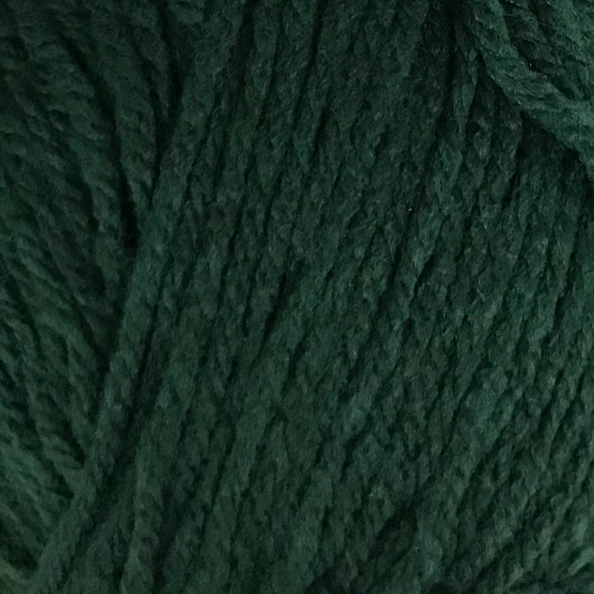 Close-up of dark green yarn ball