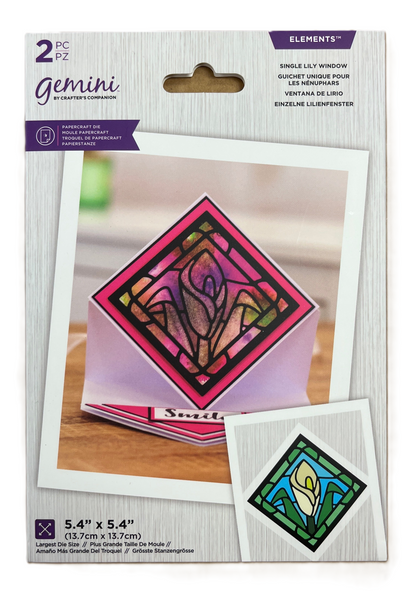 Packaging of Gemini stained glass window kit with a sample design on a white background