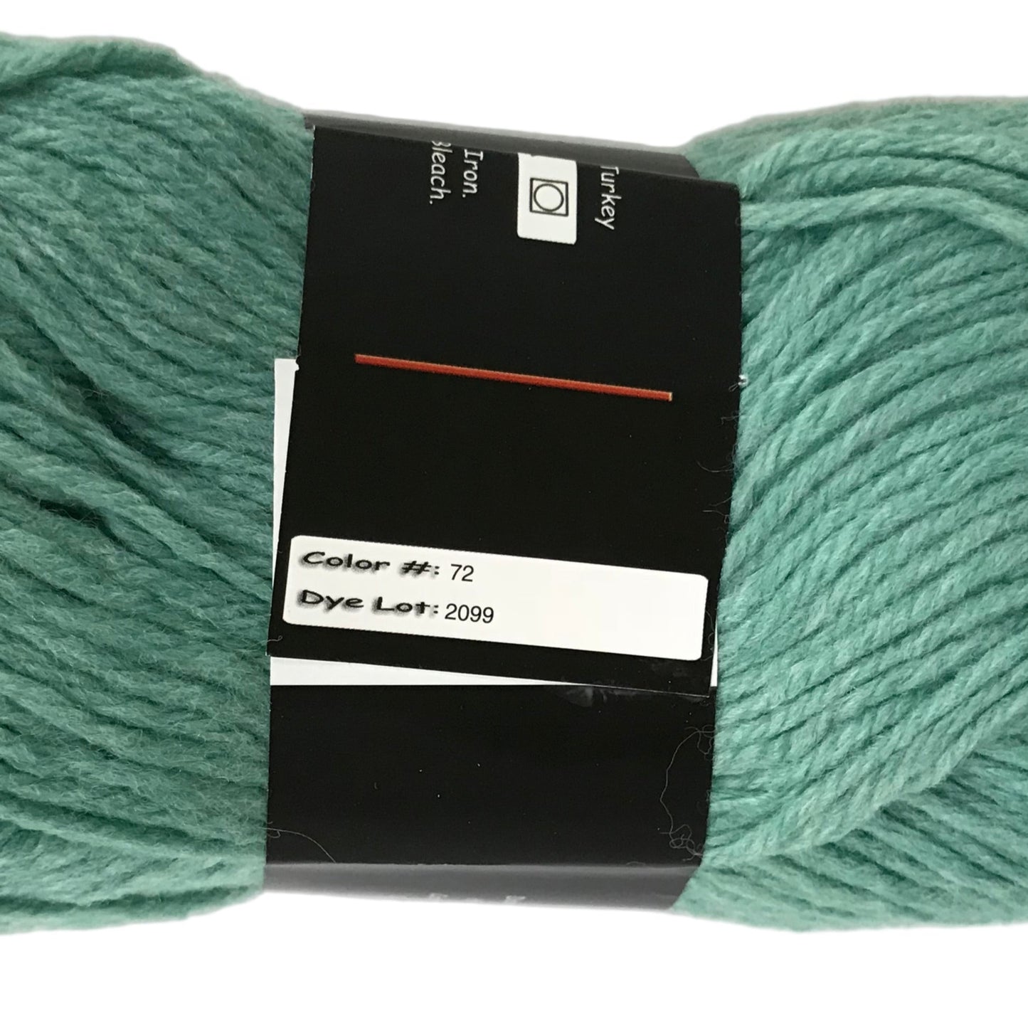 Green skein of yarn with a label on a white background
