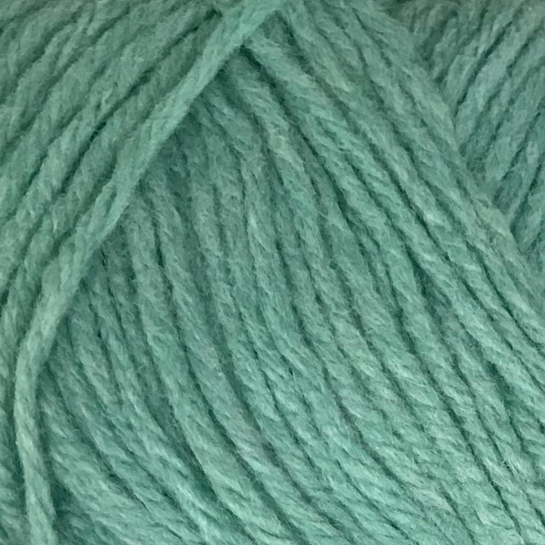 Close-up of teal yarn with a textured pattern