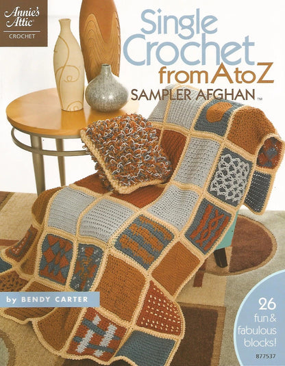 Crocheted Afghan with Colorful Squares on a Couch, Book Cover of 'Single Crochet from A to Z Sampler Afghan' by Annie's Attic