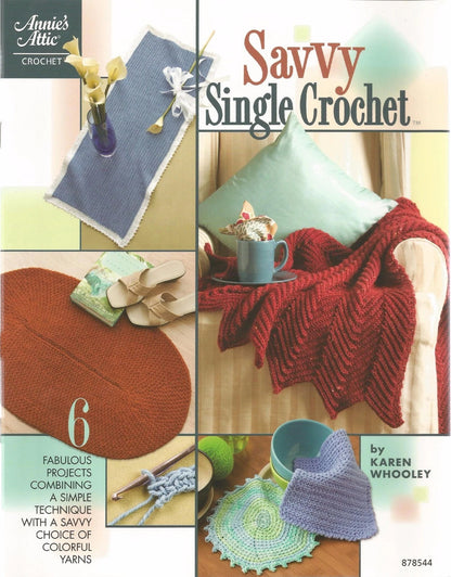 Book cover of 'Savvy Single Crochet' by Karen Woolley featuring crochet projects and colorful yarn.