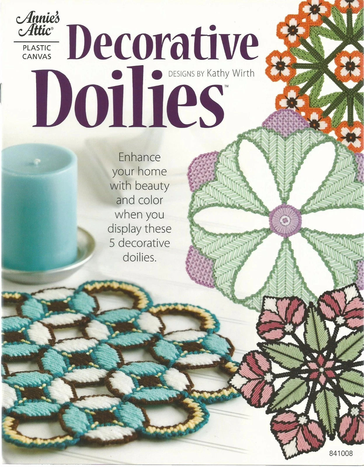 Decorative doilies with colorful patterns on a book cover, featuring Annie's Attic branding.