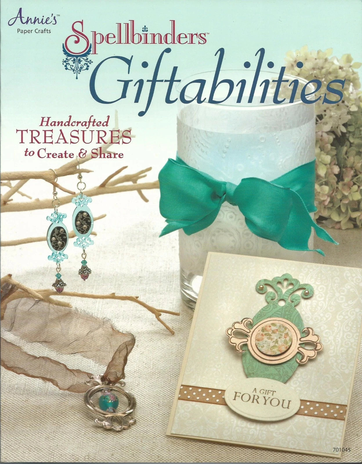 Book cover of 'Annie's Spellbinders Giftabilities' with decorative items and text.