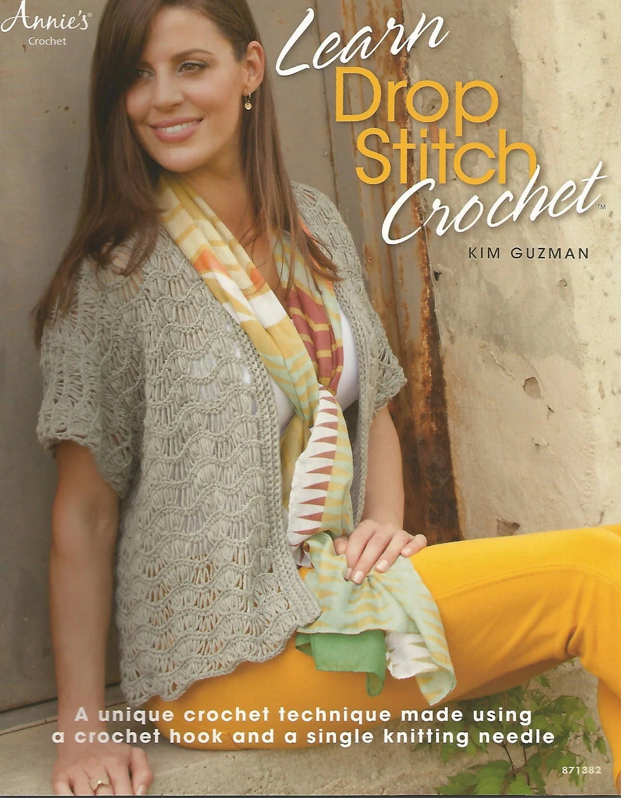 Book cover of 'Learn Drop Stitch Crochet' by Kim Guzman featuring a woman wearing a crocheted garment.
