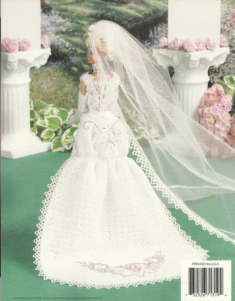 Bridal gown with a long veil on a green background