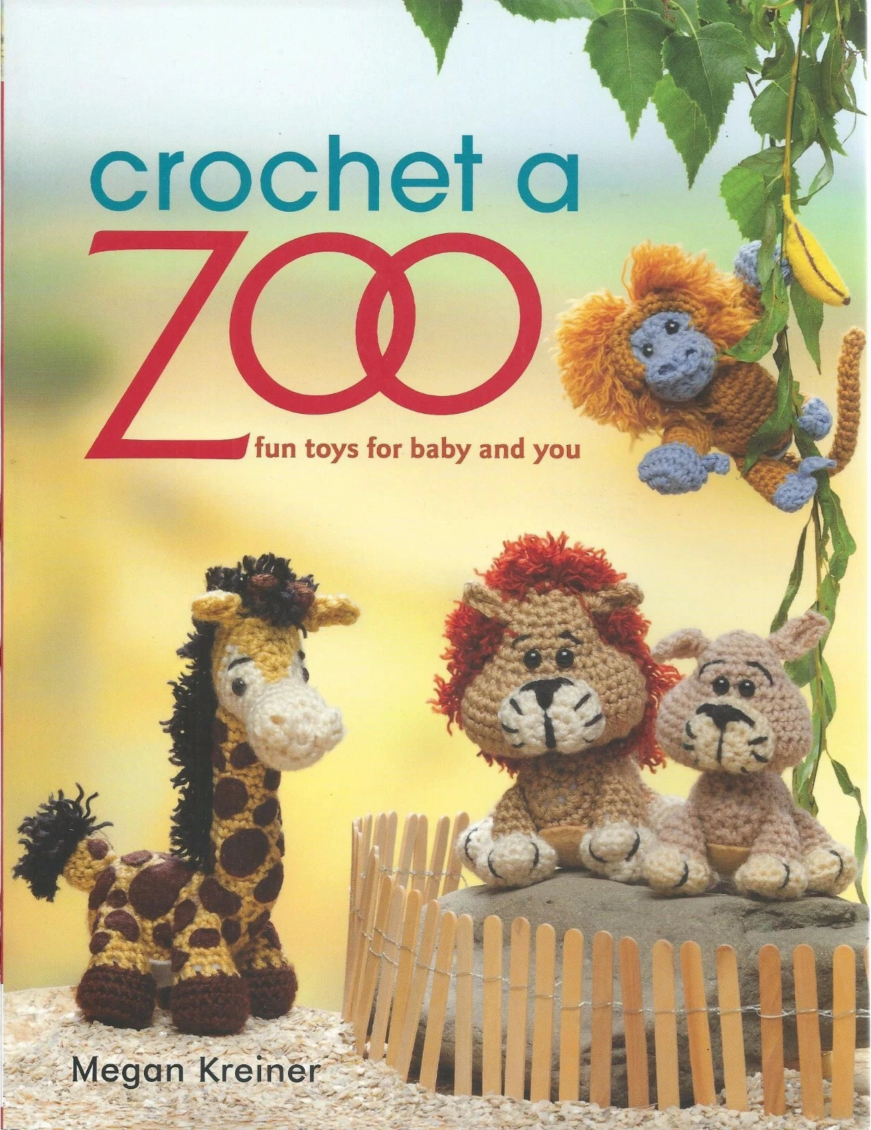 Book cover of 'Crochet a Zoo' with crochet animals and text.