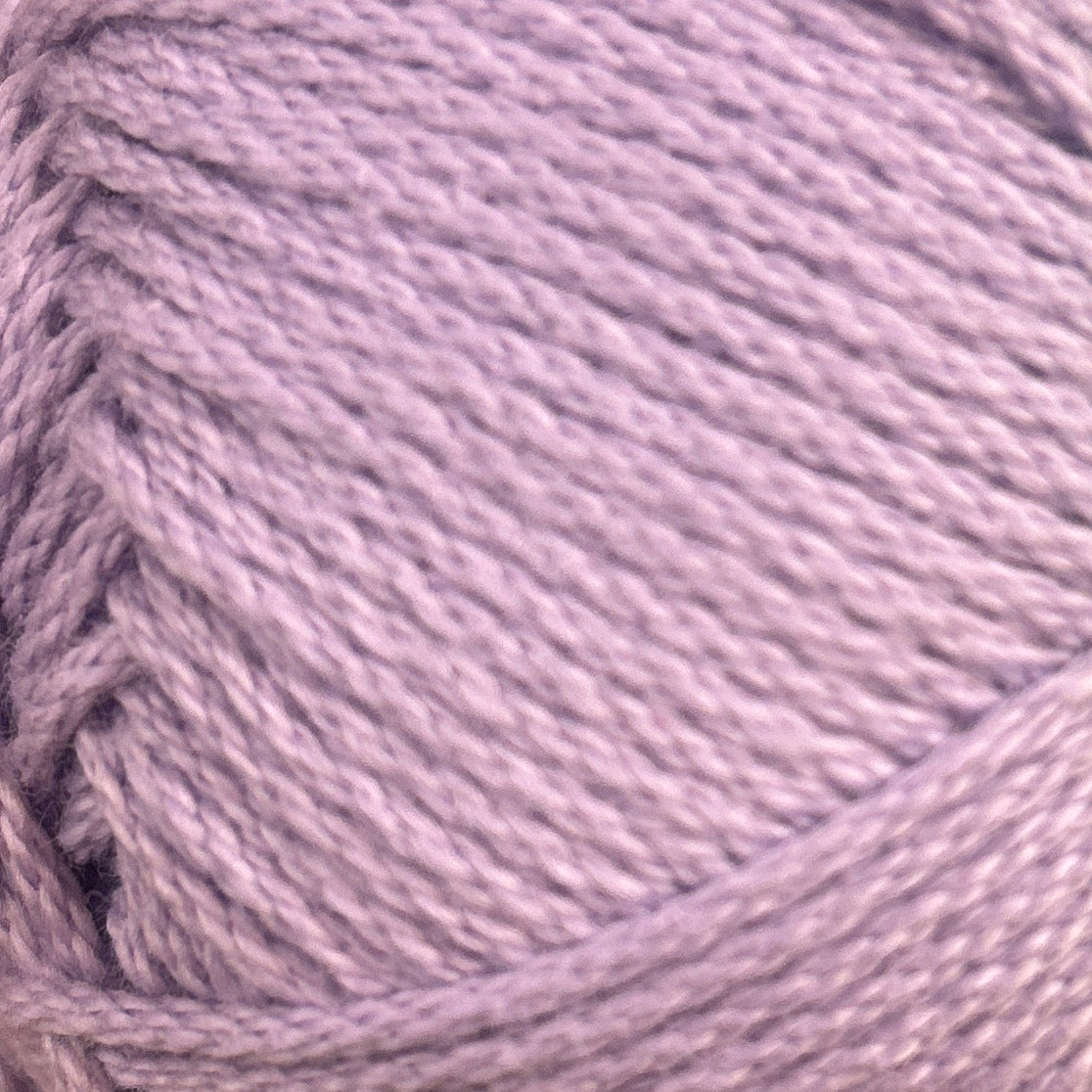 Close-up of a ball of purple yarn
