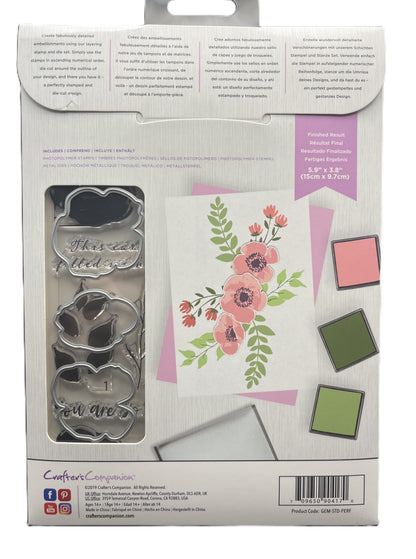 Packaging of metal stamps with floral design and text on a white background