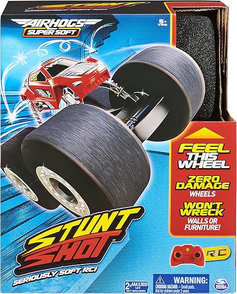 Box of AirHogs Stunt Shot RC toy with wheels and branding.