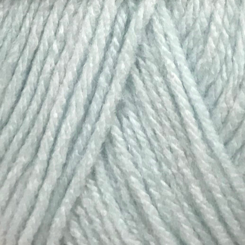 Light blue skein of yarn with a label on a white background