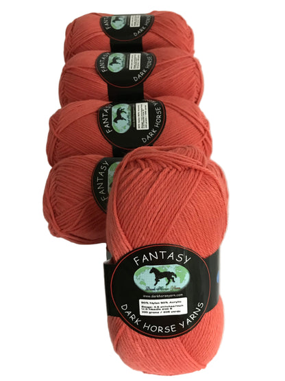 Four skeins of red yarn with labels on a white background