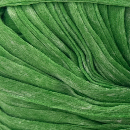 Green ball of yarn with a label on a white background
