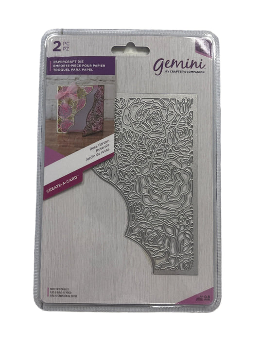 Packaged Gemini embossing folder with floral design on a white background