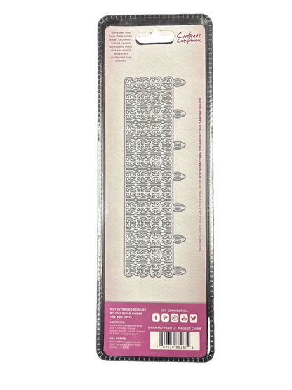 Clear plastic packaging with a patterned design on a dark surface