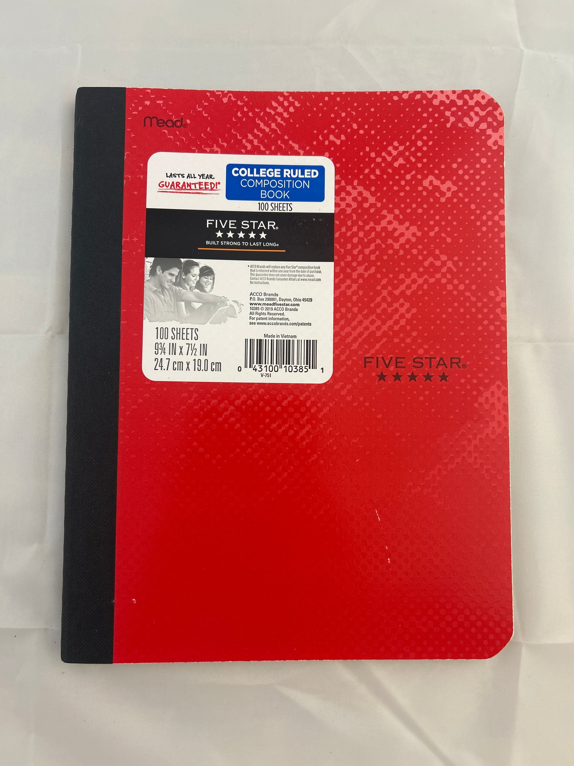 Red notebook with a Five Star label on a white background