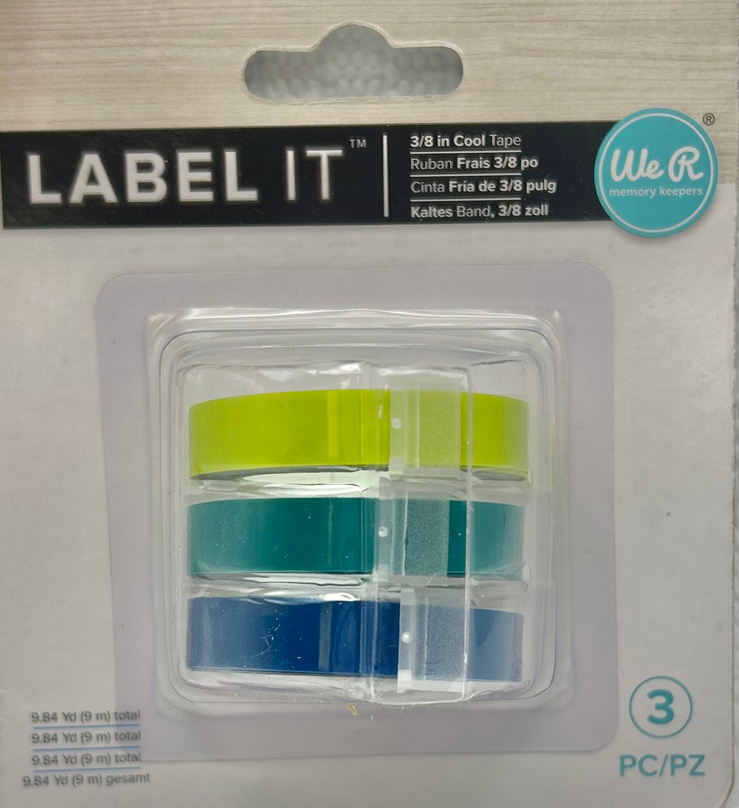 Packaged set of colorful tape rolls with 'Label It' branding on a gray background.