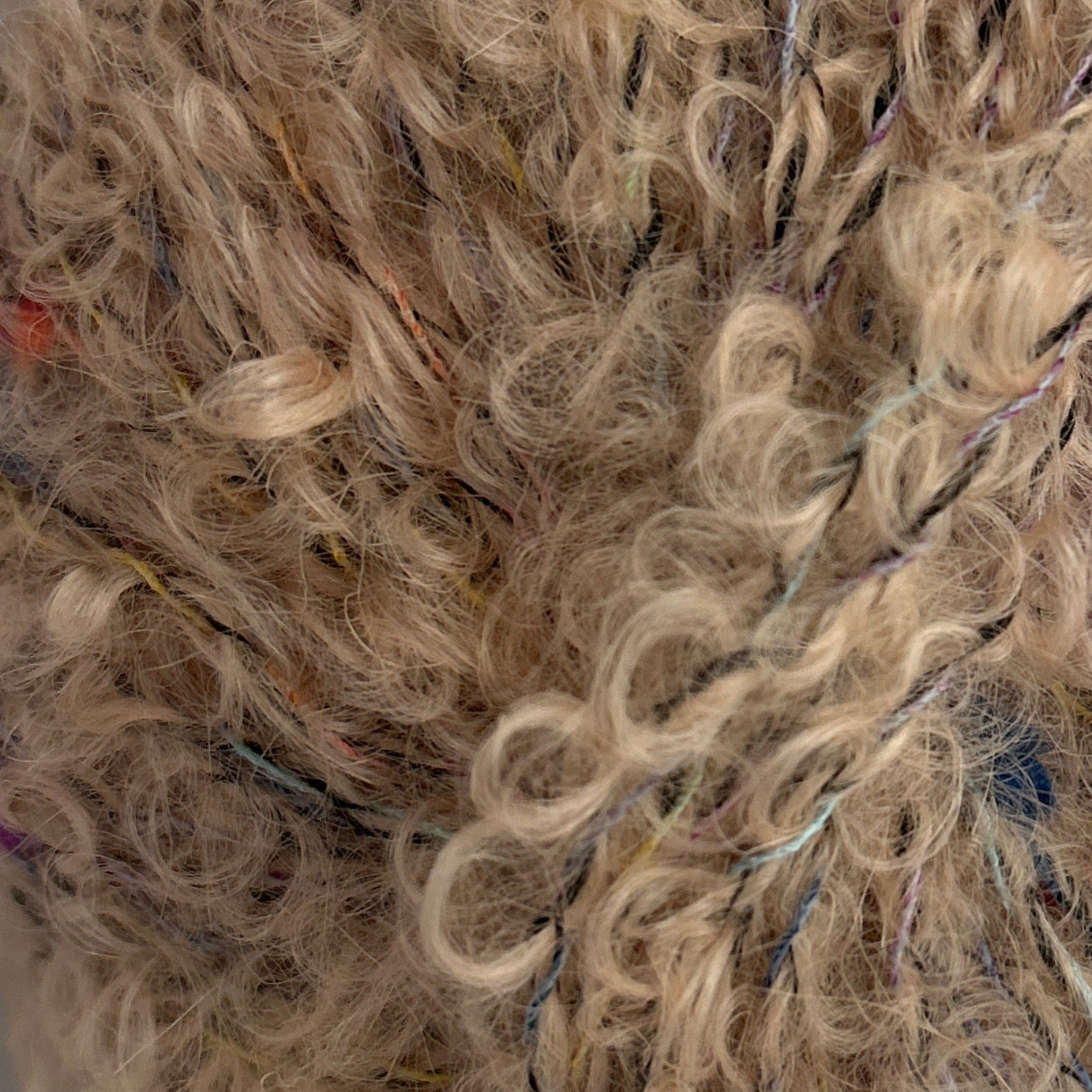 Ball of yarn with a label on a white background