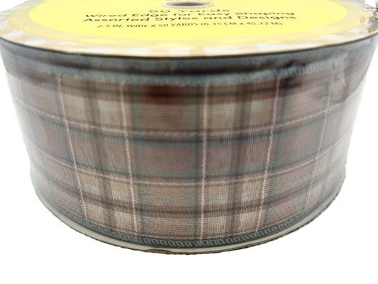 Plaid ribbon roll with a label on a white background