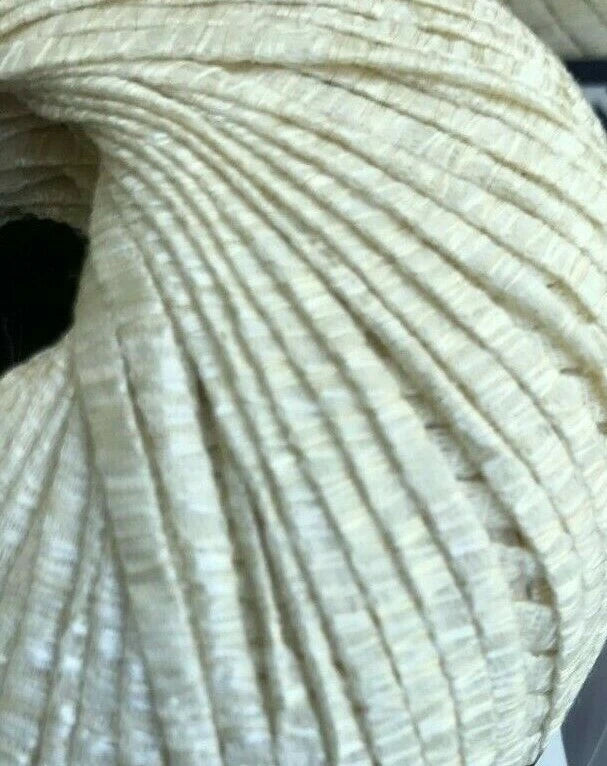 Close-up of a ball of beige yarn