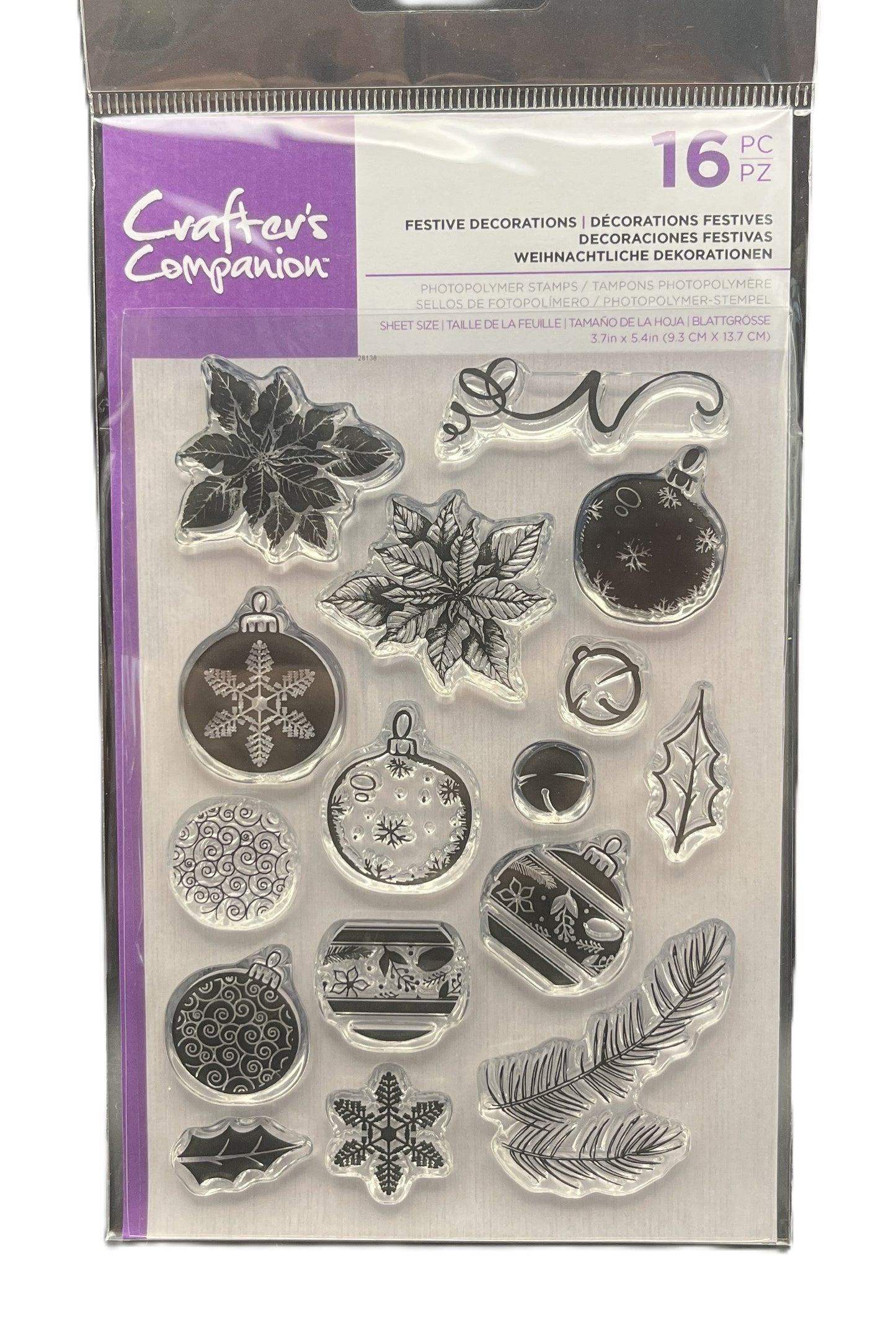 Pack of clear stamps with festive designs on a purple and white background