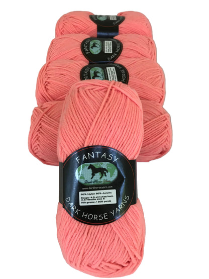 Four skeins of pink yarn with 'Dark Horse Yarns' labels on a white background