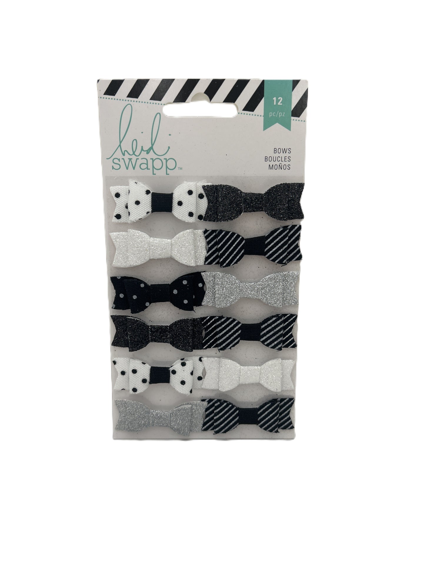 Pack of black and white hair bows with a 'Lil' Swapp' label on a white background