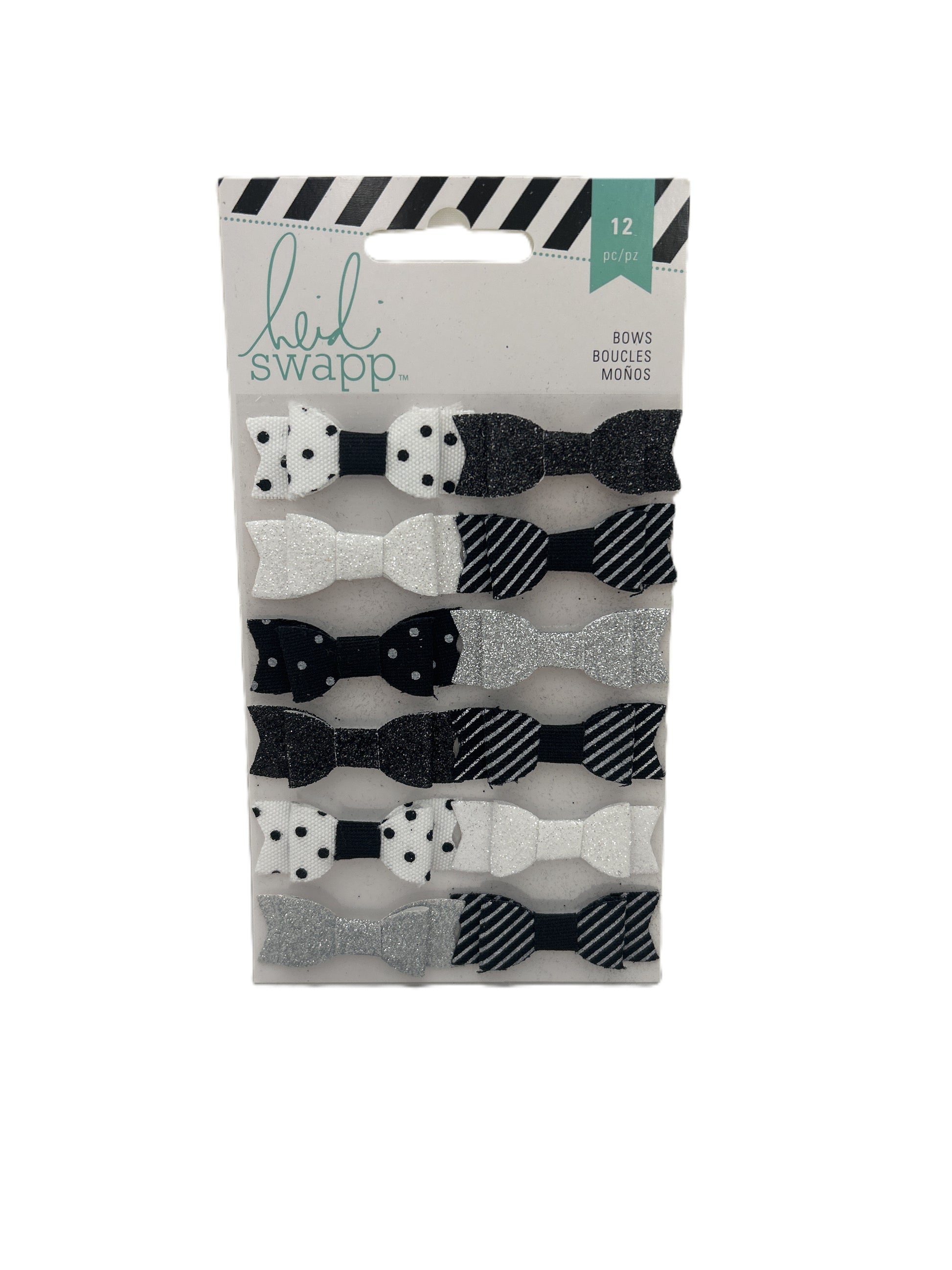 Pack of black and white hair bows with a 'Lil' Swapp' label on a white background