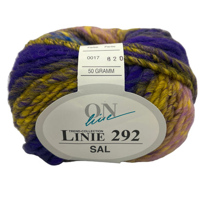 Multicolored yarn ball with a label on a white background