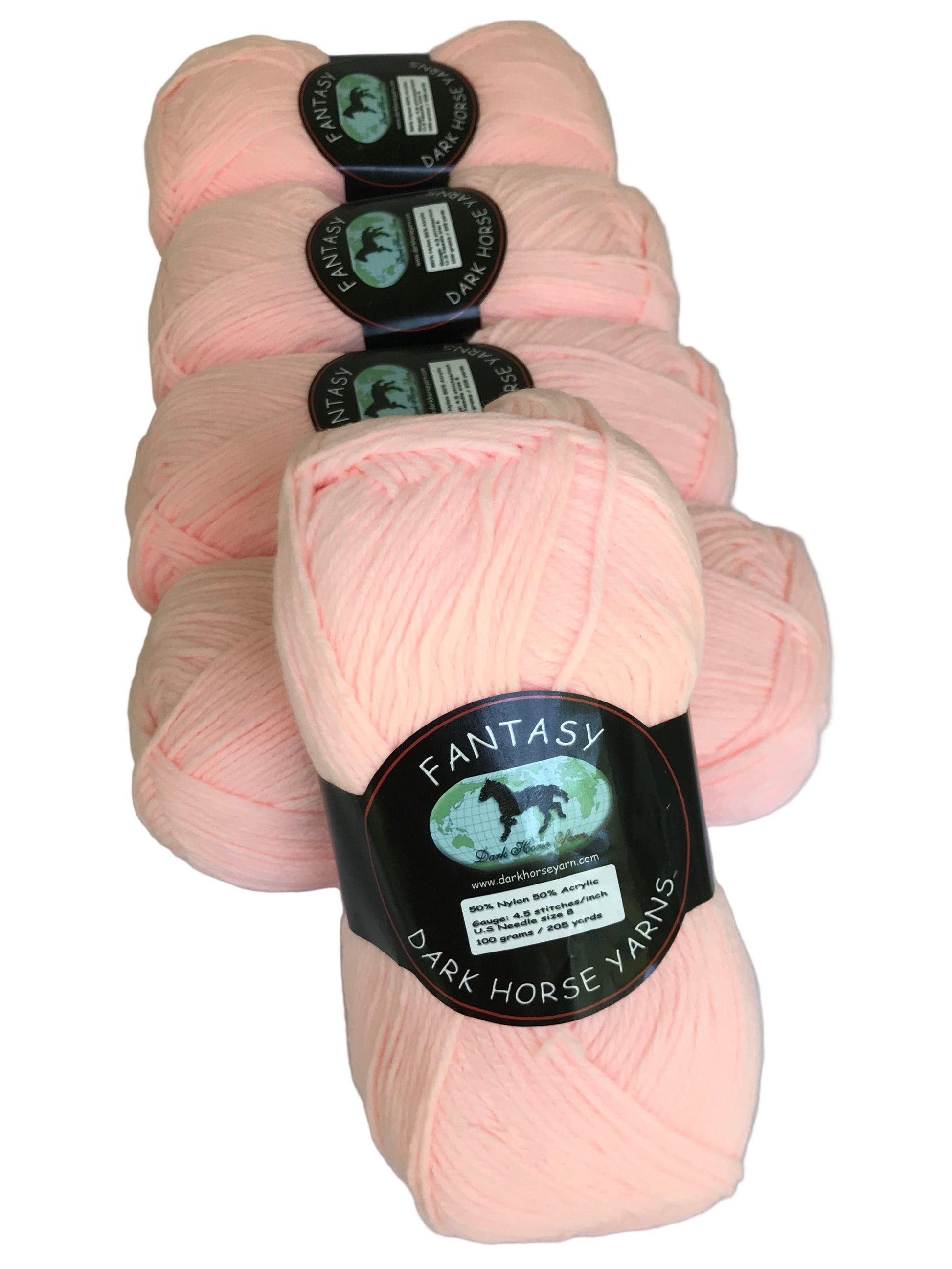 Pink yarn skeins with 'Fantasy' label on a white background