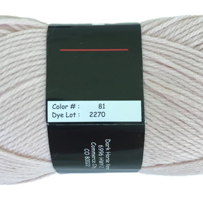Ball of yarn with a label on a white background