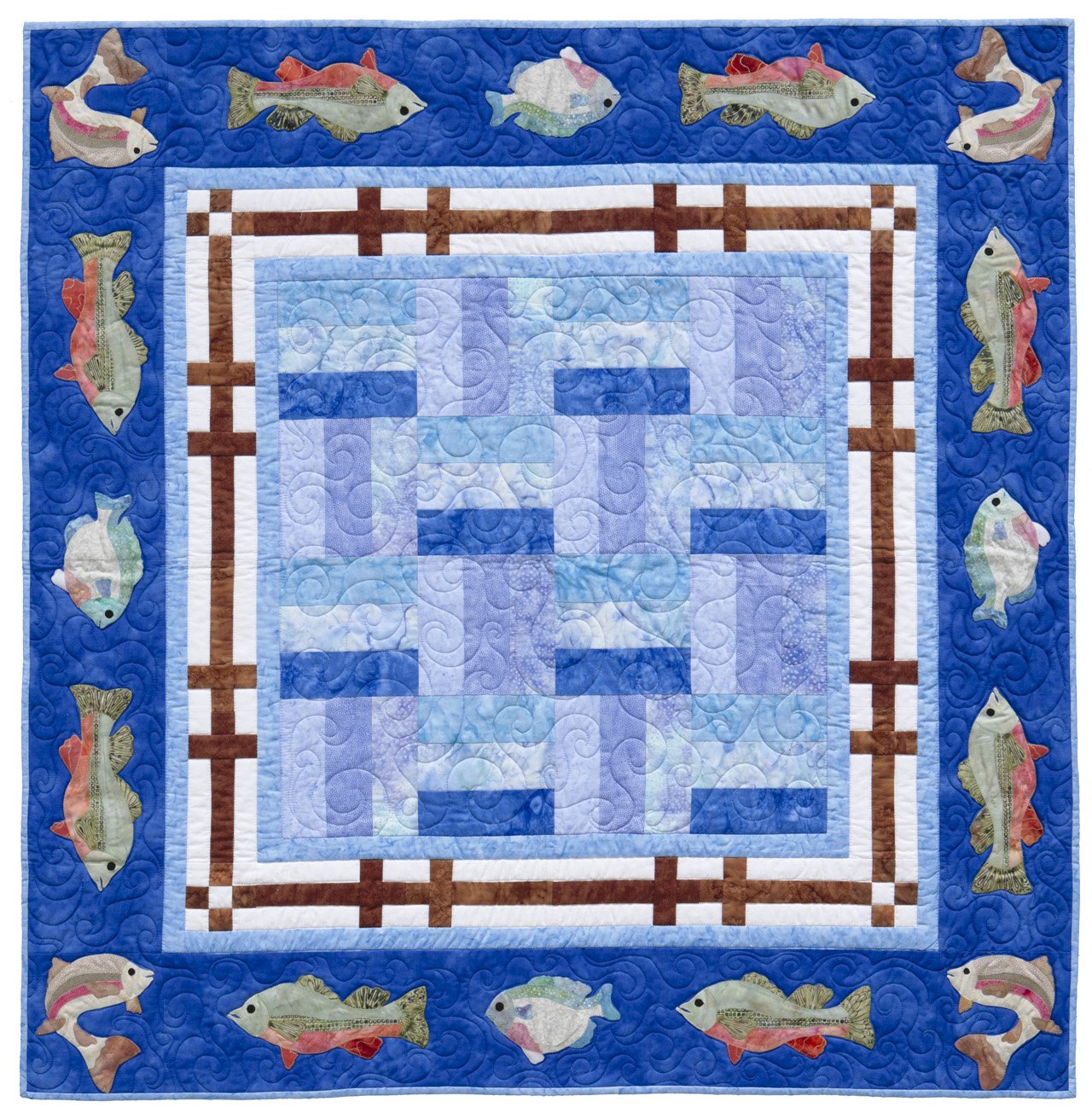 Quilt with fish pattern on a blue background