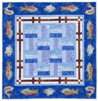 Quilt with fish pattern on a blue background