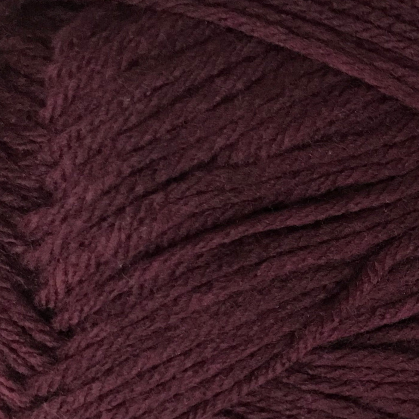 Close-up of dark purple yarn ball