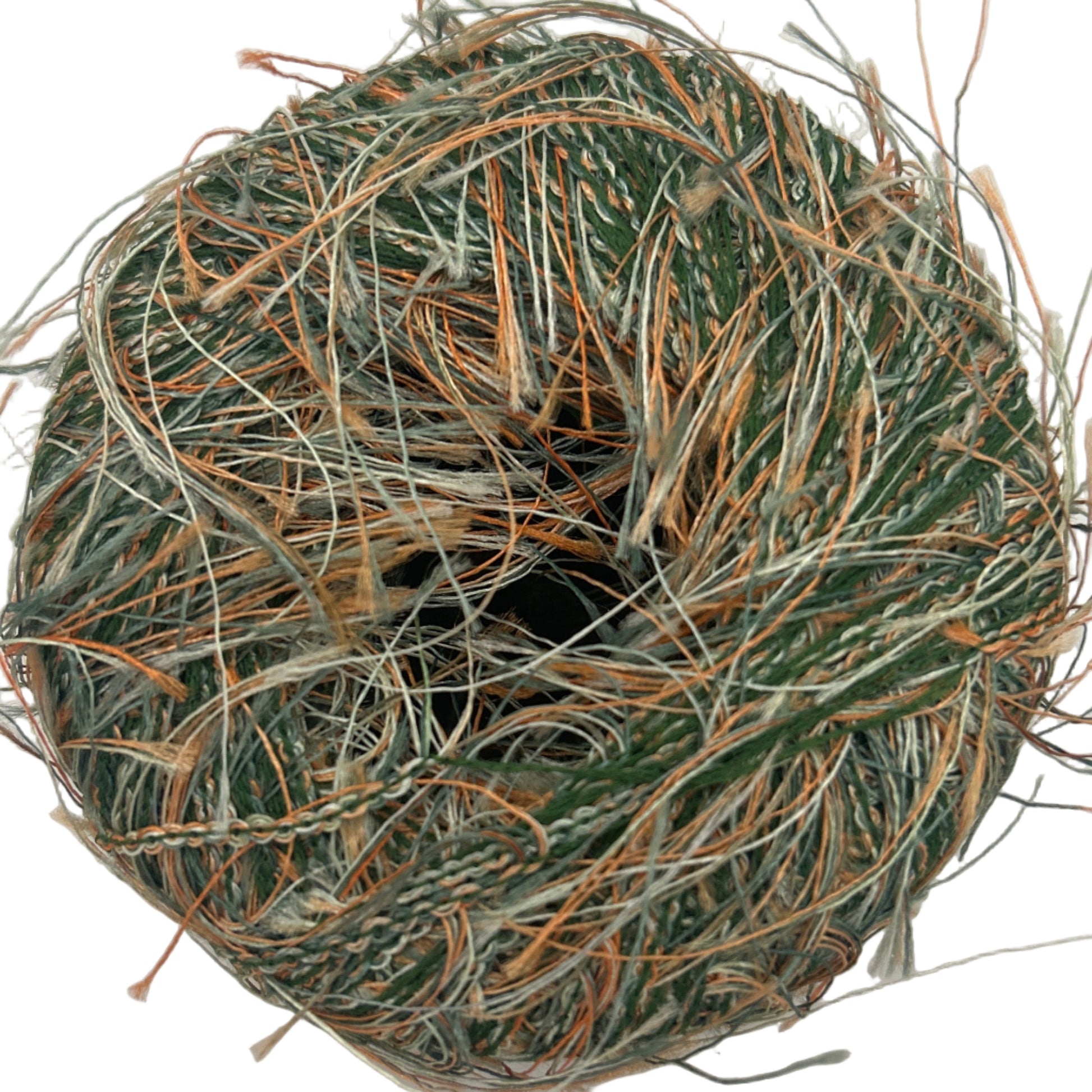 Ball of twine with green and brown fibers on a white background