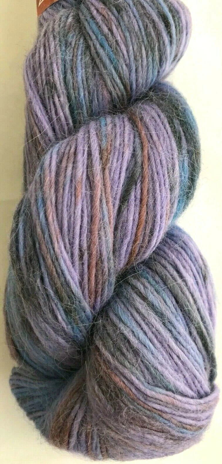 Multicolored skein of yarn on a light background