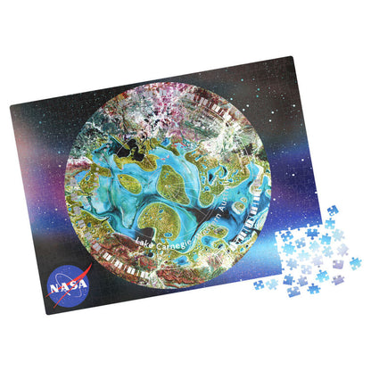 Jigsaw puzzle with NASA logo featuring a celestial design on a white background