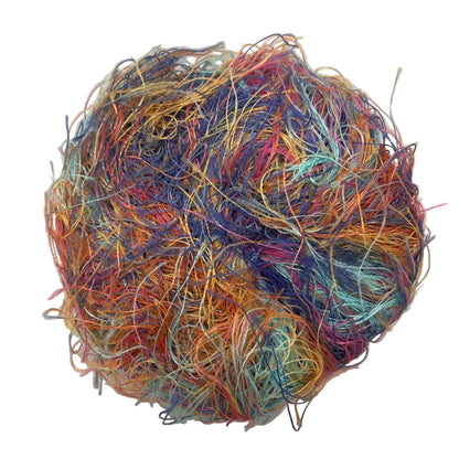 Multicolored skein of yarn on a white background