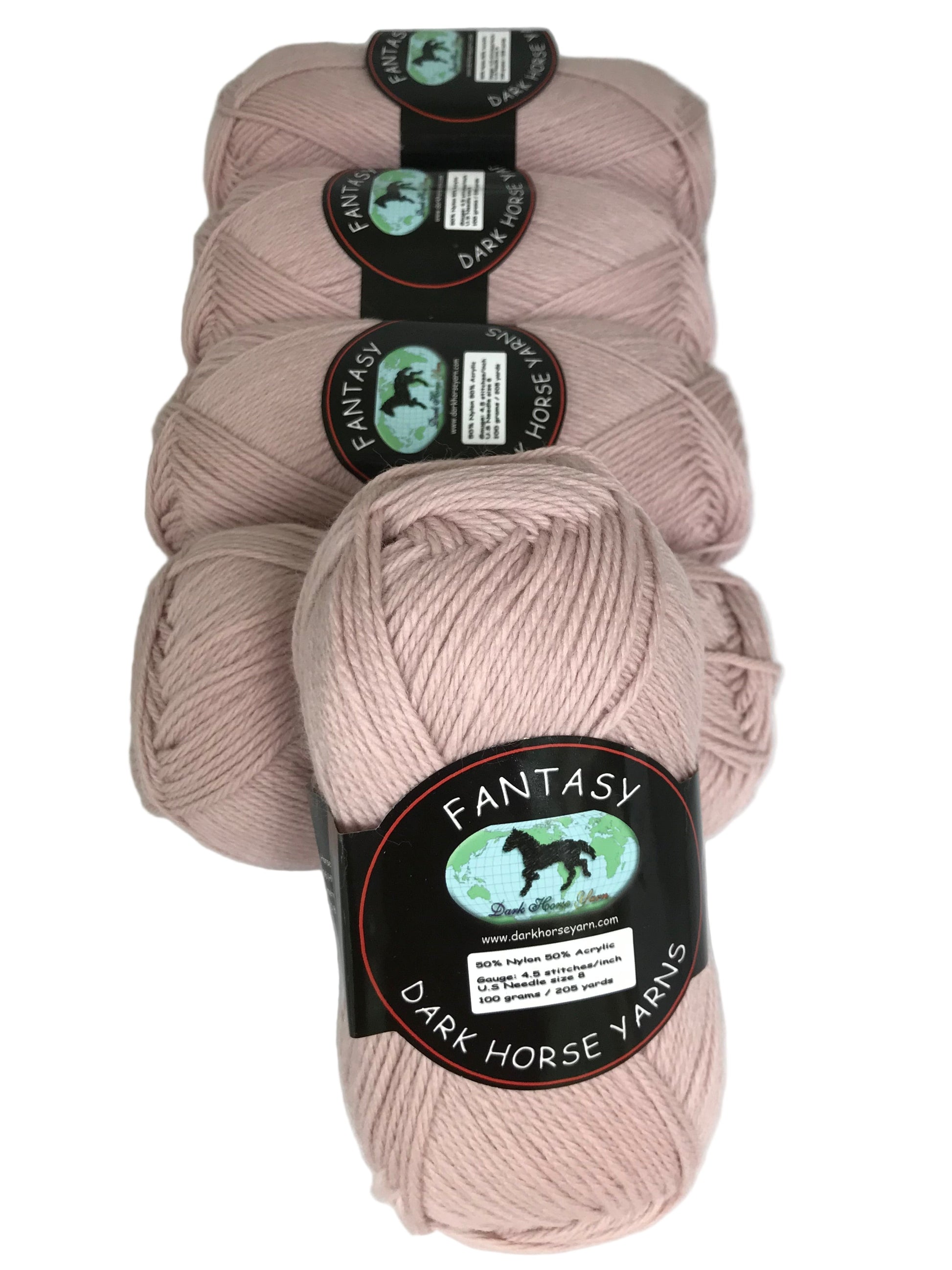 Pink yarn skeins with 'Fantasy' label on a white background