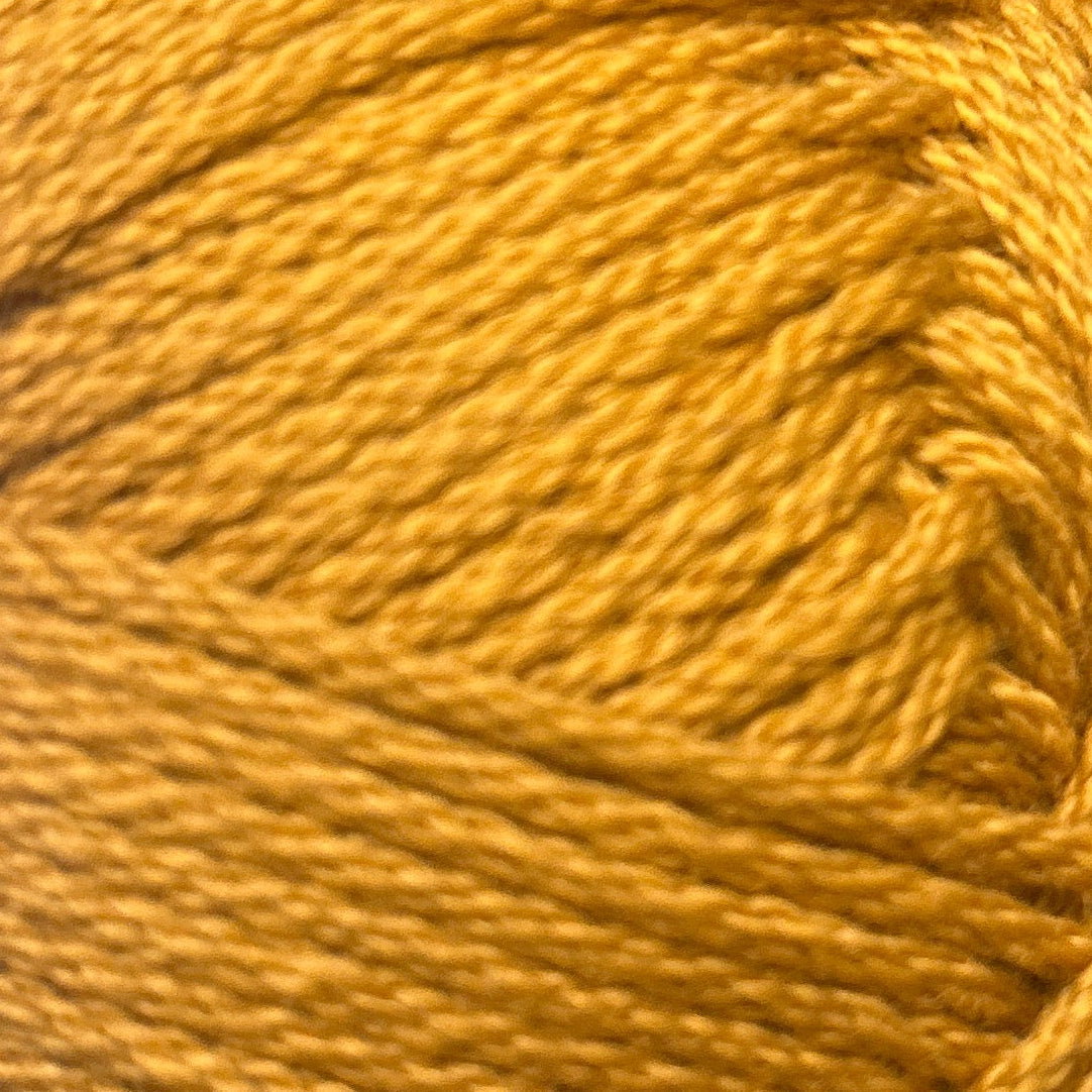 Close-up of a ball of yellow yarn