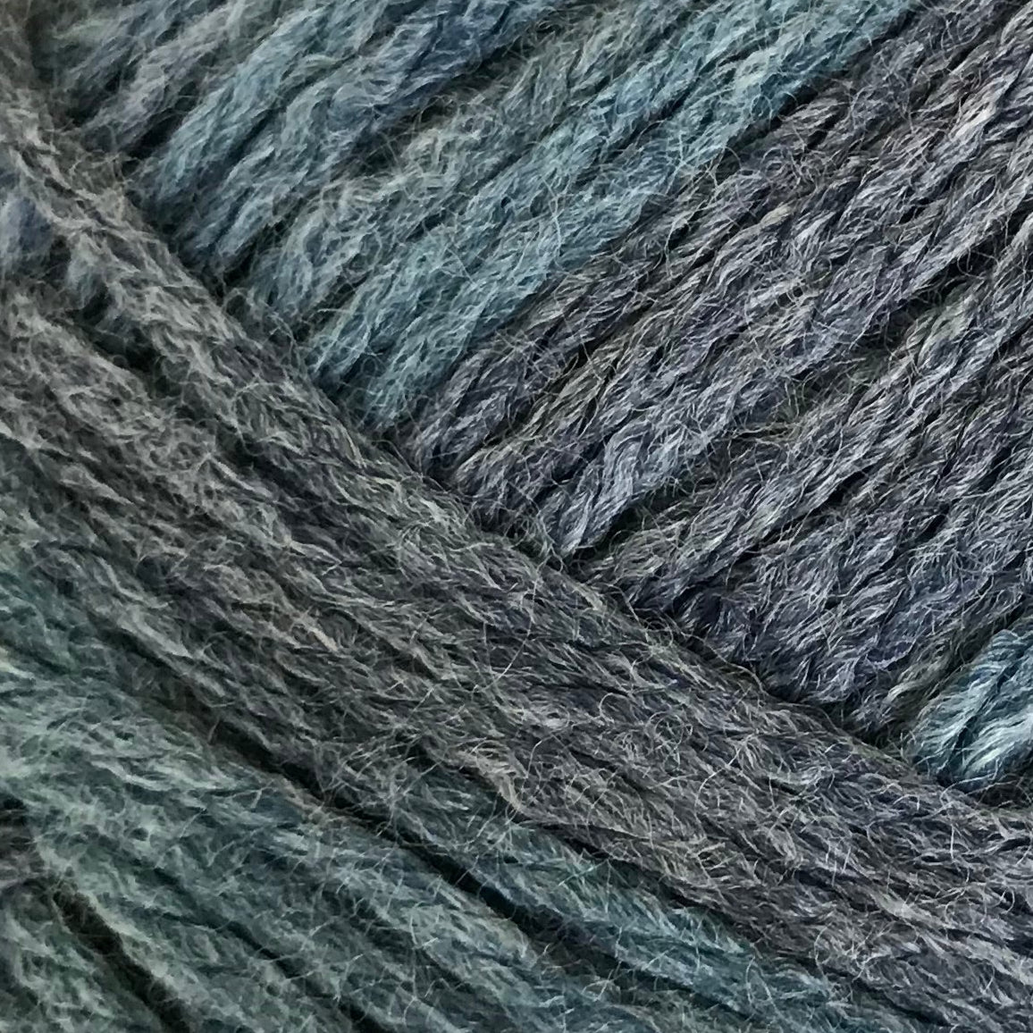 Close-up of blue and gray yarn strands