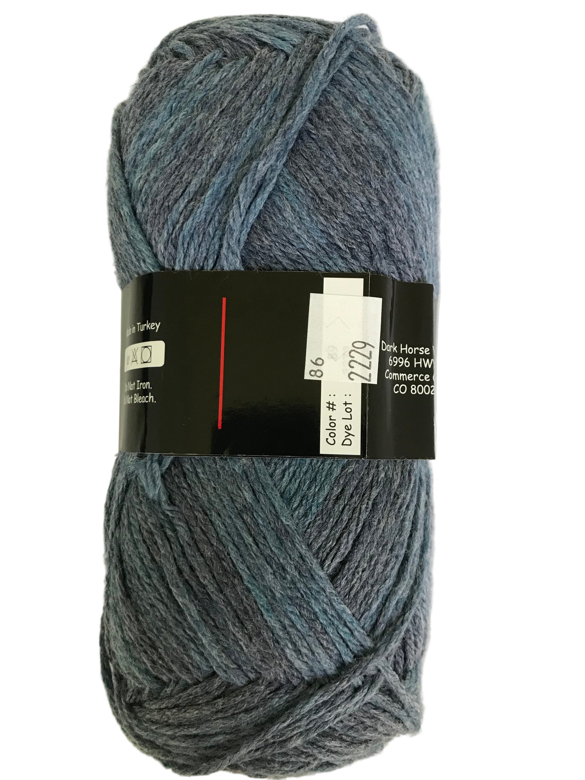 Blue skein of yarn with a label on a white background