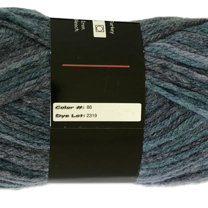 Blue skein of yarn with a label on a white background