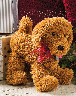 Brown teddy bear with a red bow sitting on a surface.