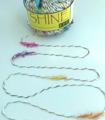 Yarn with colorful strands on a light background