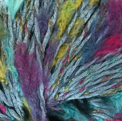 Multicolored yarn ball on a white background