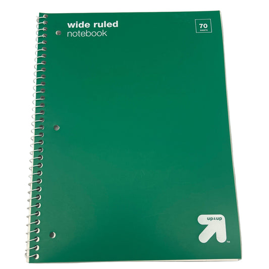 Green notebook with 'wide ruled' text and 'up & up' logo on a white background
