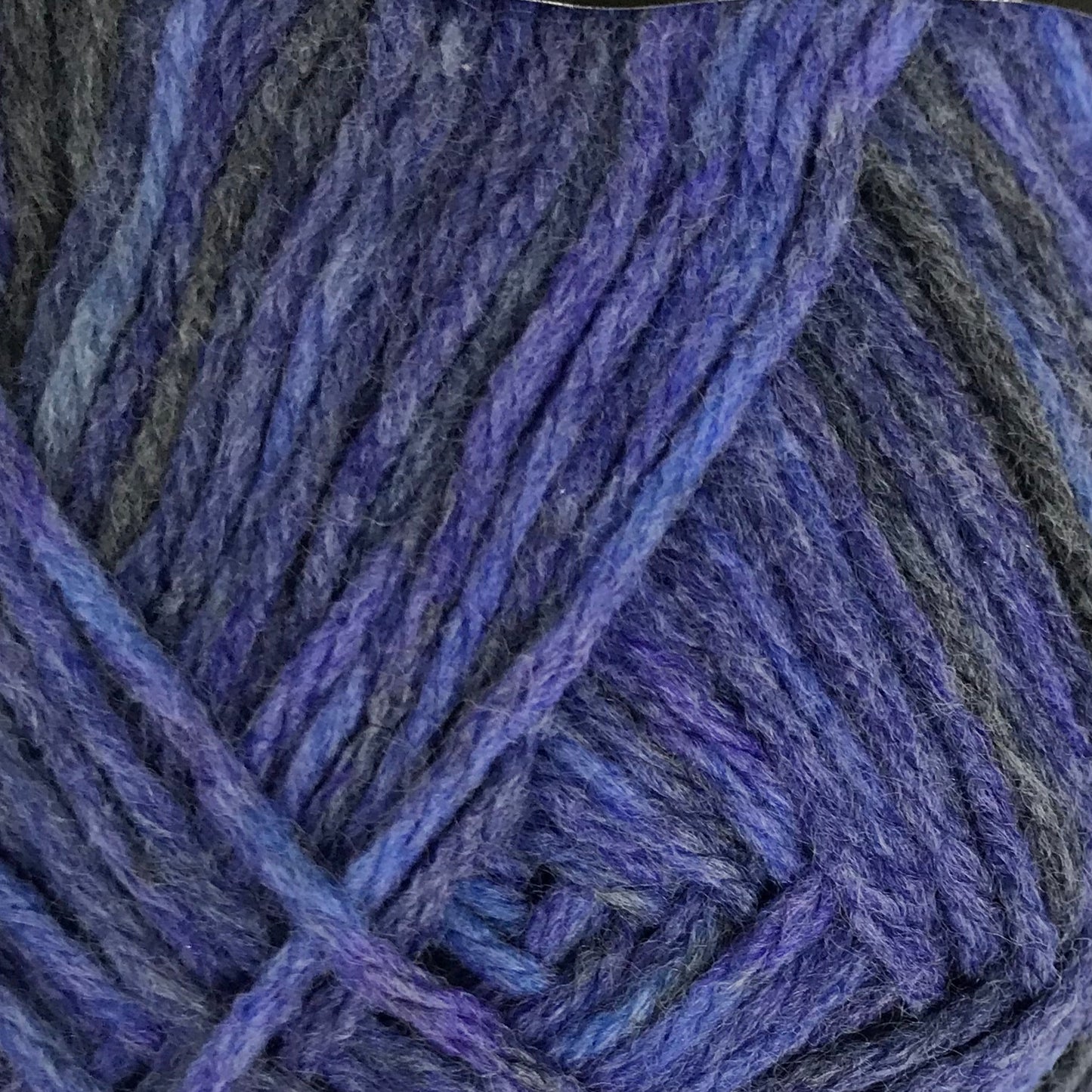 Blue skein of yarn on a white background