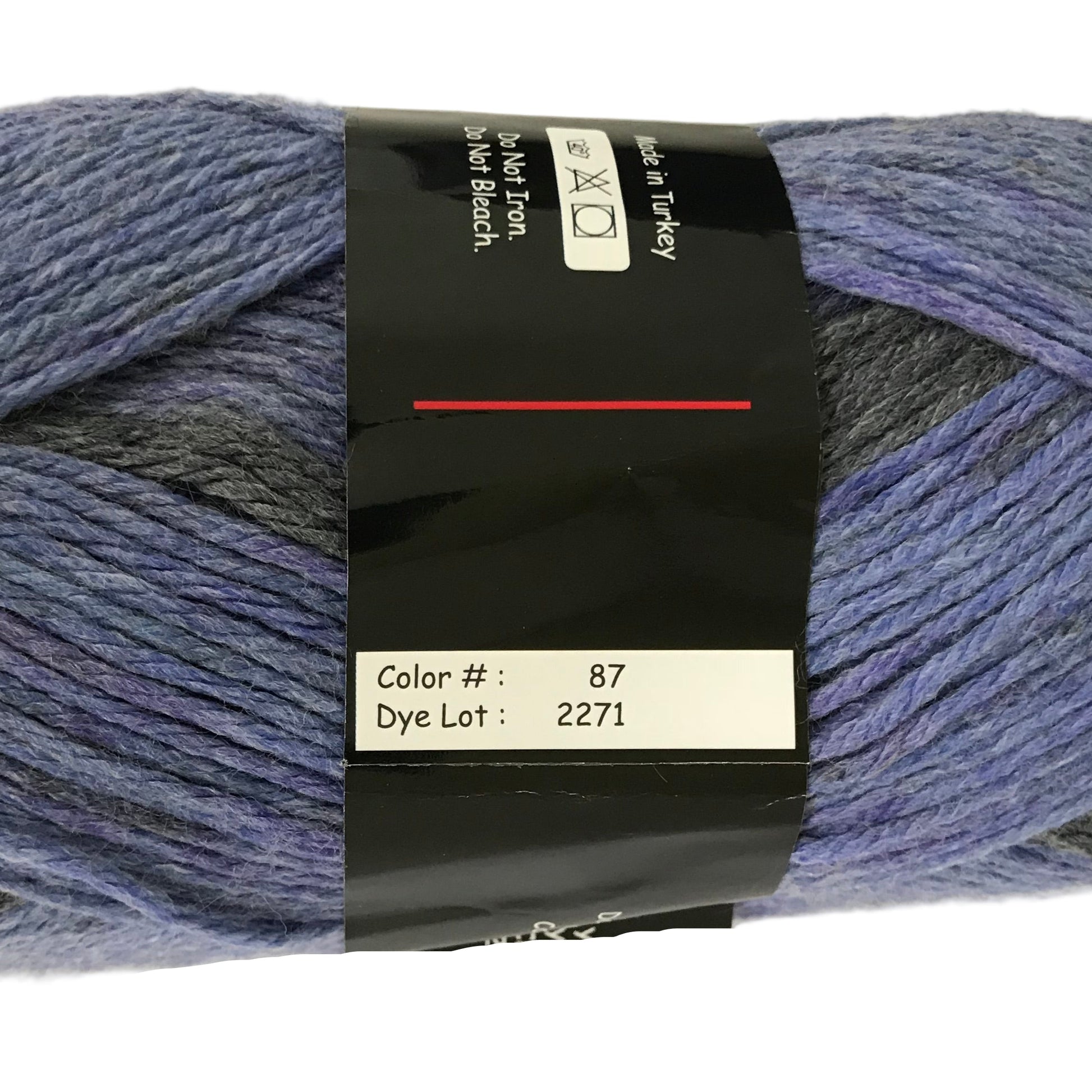 Blue yarn skein with a label on a white background