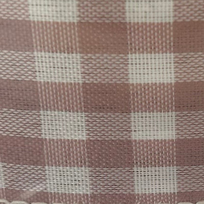 Roll of checkered ribbon with a clear plastic cover on a white background